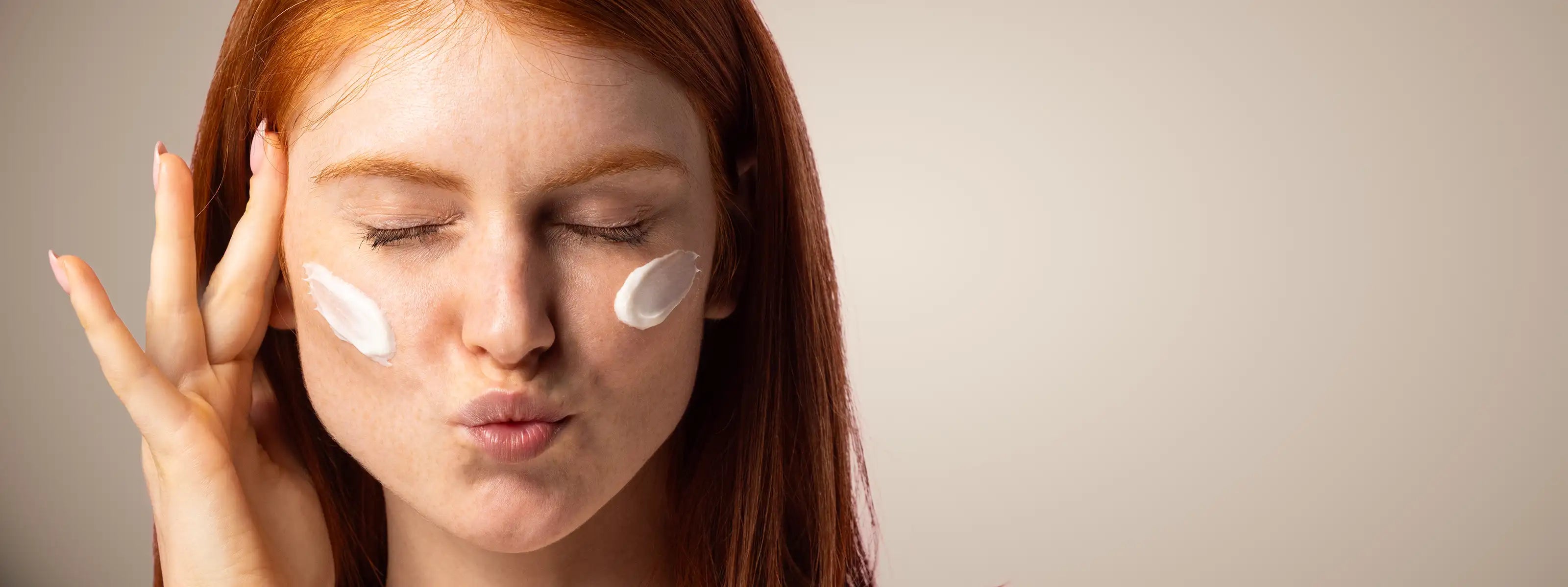 Model applying cream banner