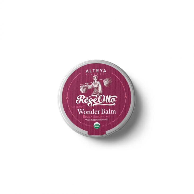 Organic Rose Otto Wonder Balm helps silken, moisturize and boost natural skin glow. Formulated with the pure and precious Bulgarian Rose Otto this aromatherapy balm helps enhance romance, attract love and uplift the spirits, inspires harmony and rejuvenates body and mind.